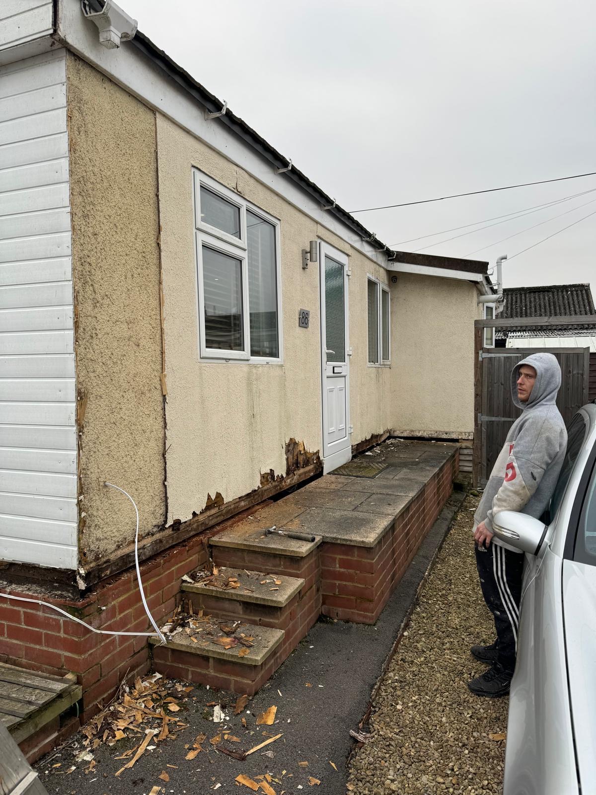 Original park home exterior being assessed before renovation work begins