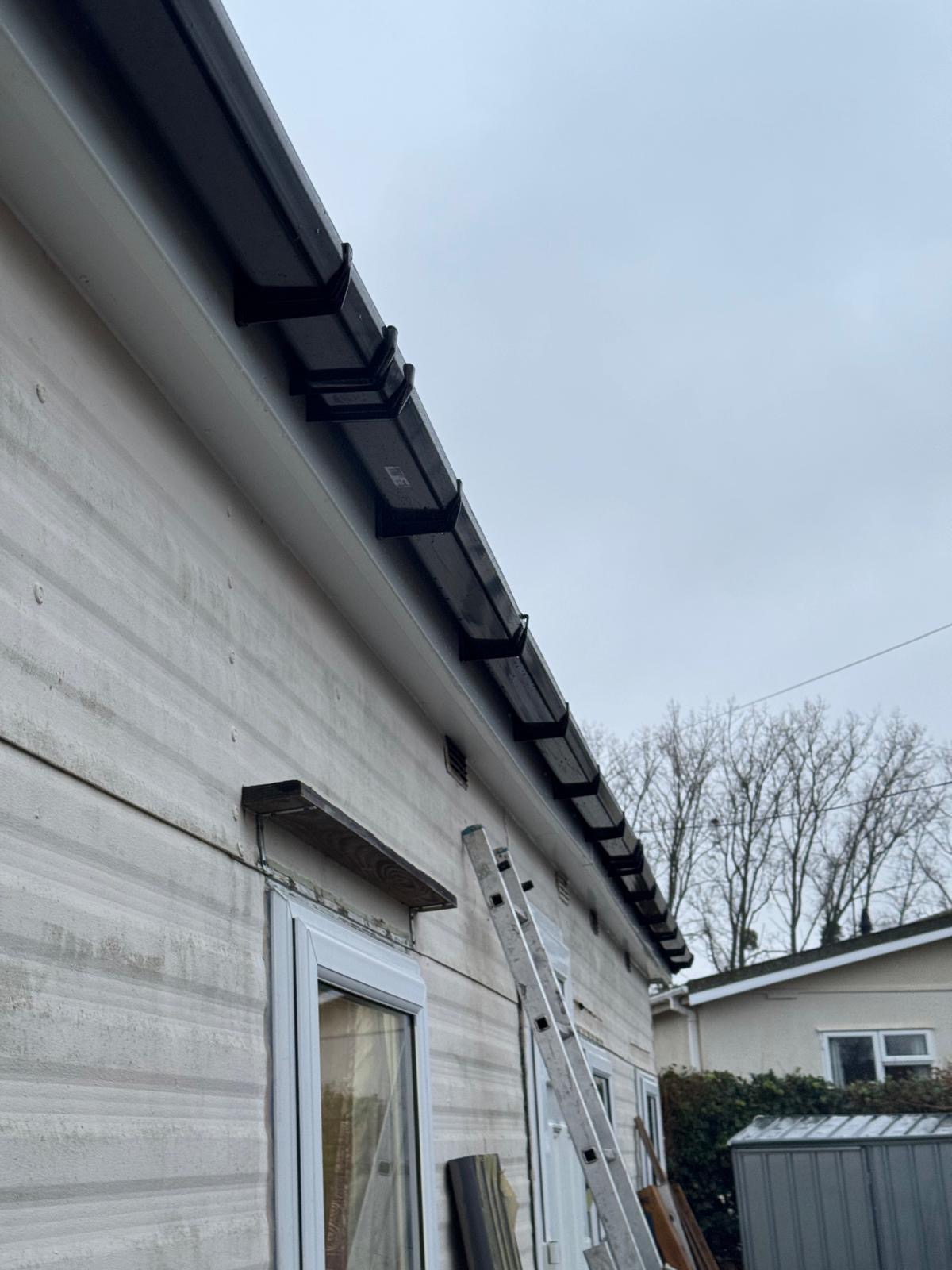 Weathered and aged park home cladding in need of replacement