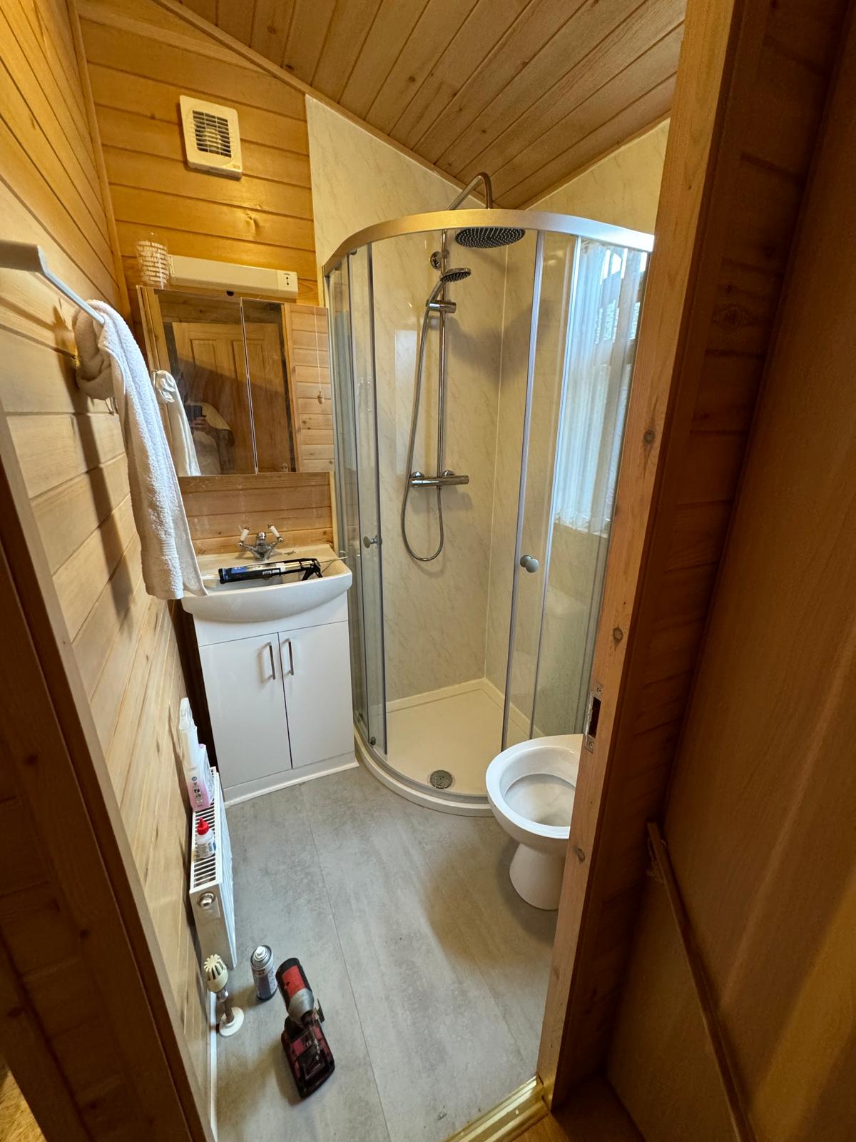 Refurbished bathroom with wood-effect finish