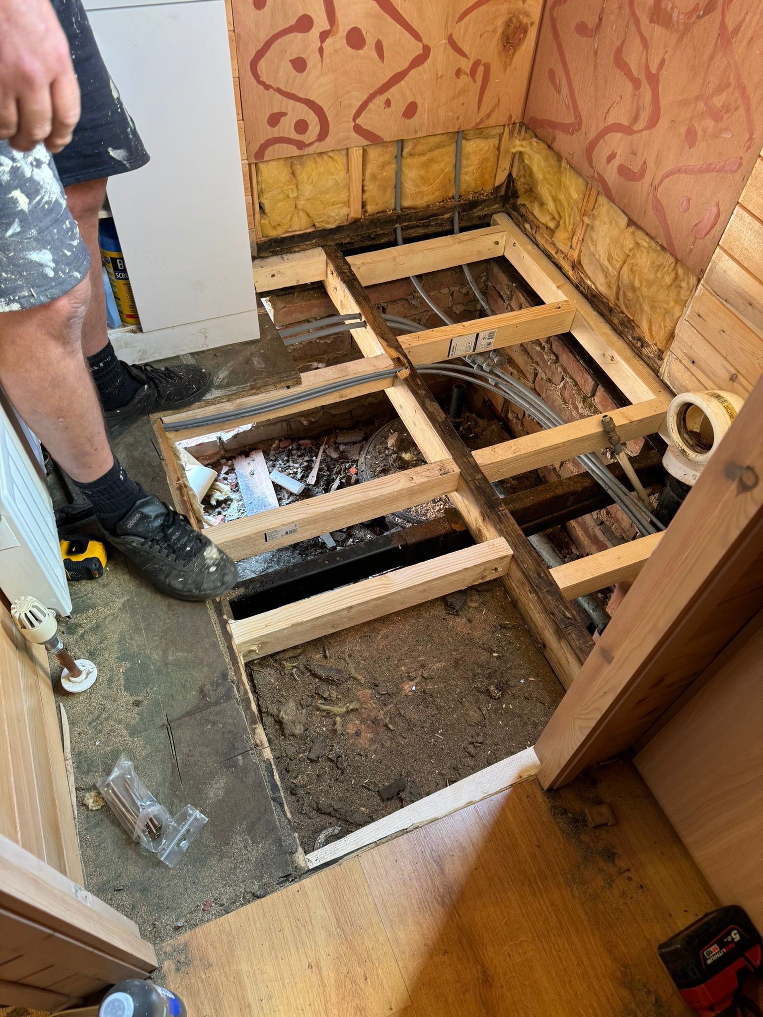 Bathroom floor joists and subfloor repaired and rebuilt during interior refurbishment