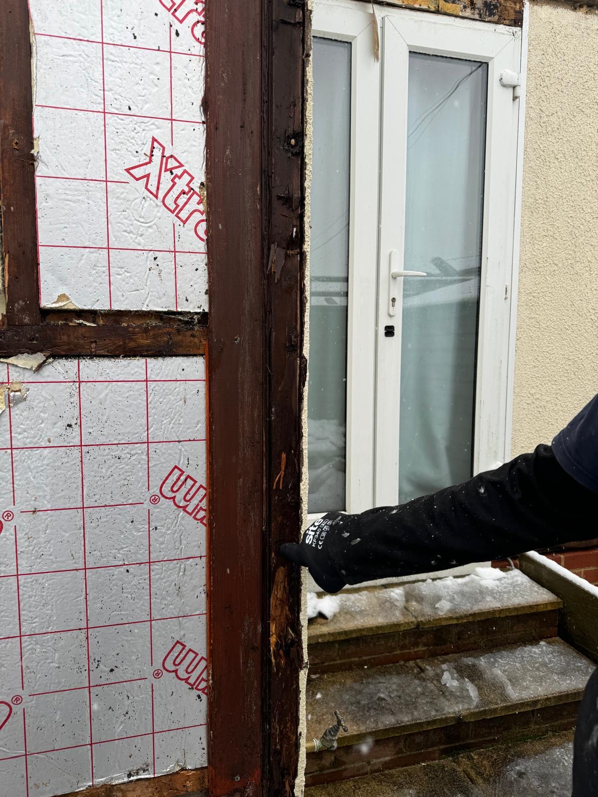 Repairing and preparing the door frame during renovation