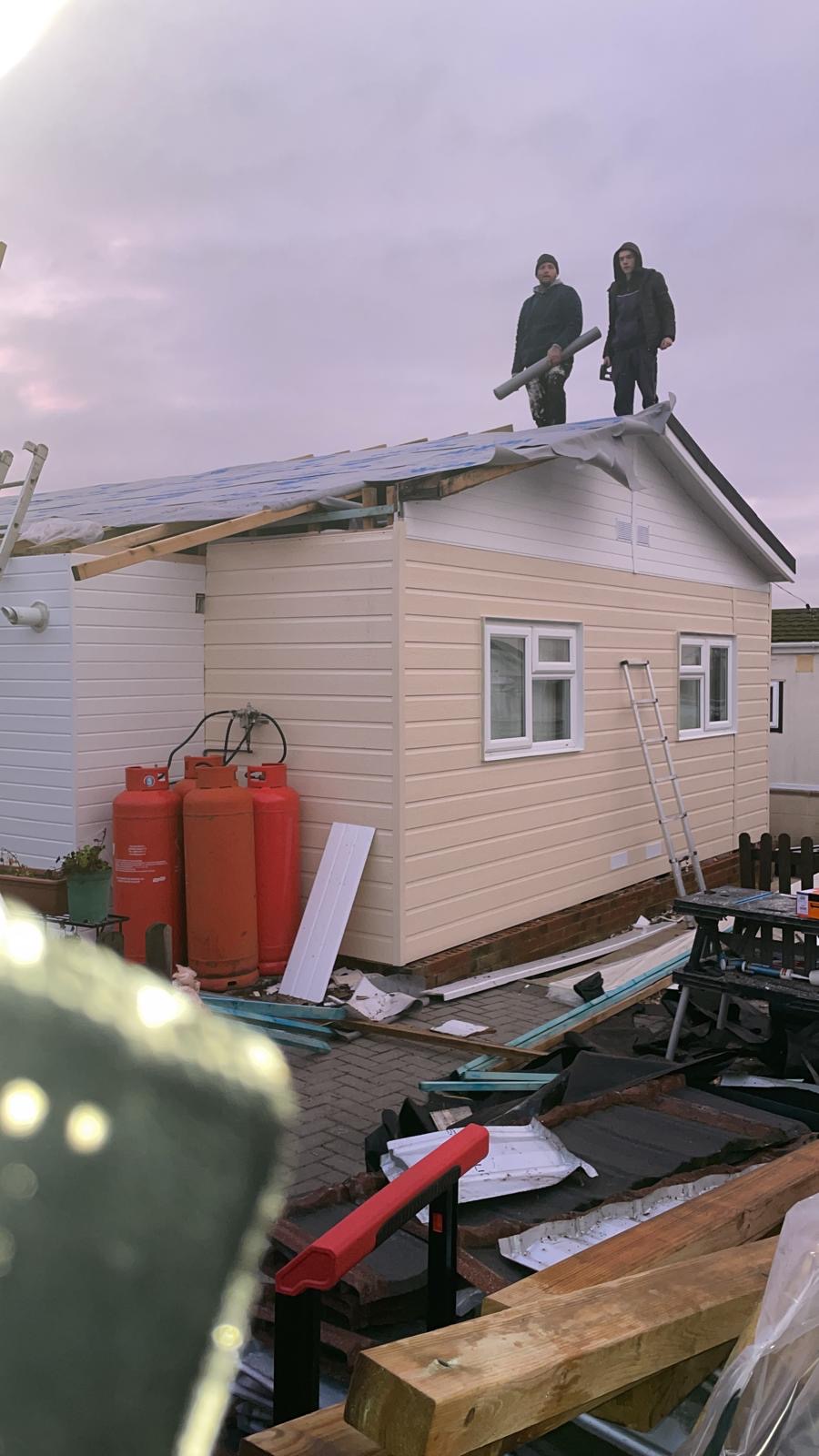 Our team working on a park home roof